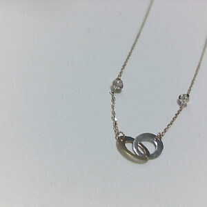 GAR. CIRCO BICOLOR 9 KTS DOBLE ANILLA