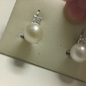 TU/YO BRI. 0.50 CT O/B PERLA 9-9,5 OMEGA