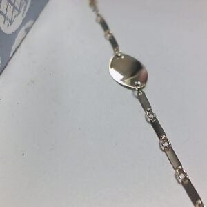 NMO O/A 9 KT BARRITAS PLACA OVAL