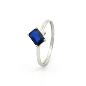 AN. BRI. 0.02 CT + ZAFIRO 0.57 CT O/B