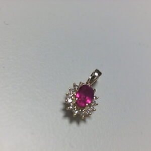 COLG. BRI. 0.15 CT + RUBI OV 0.59 CT O/A